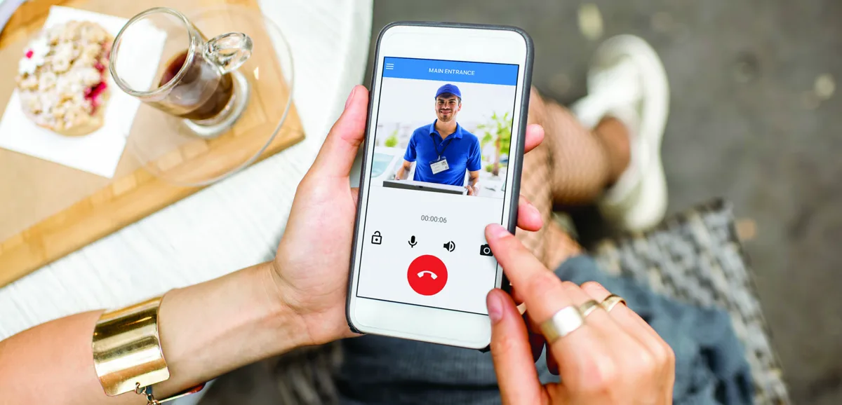 Person answering video call on mobile phone